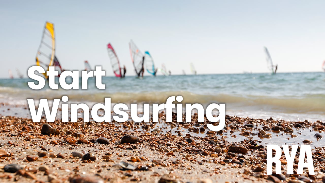 Two windsurfers on the water, featuring the caption 