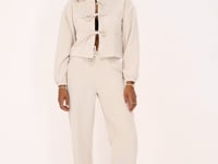 beige corduroy top with bows