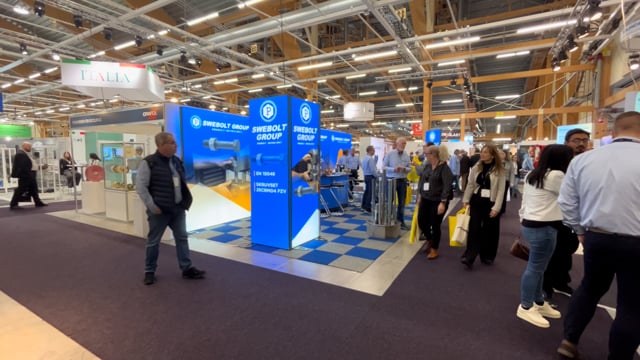 An Expand backlit stand with storage for Swebolt