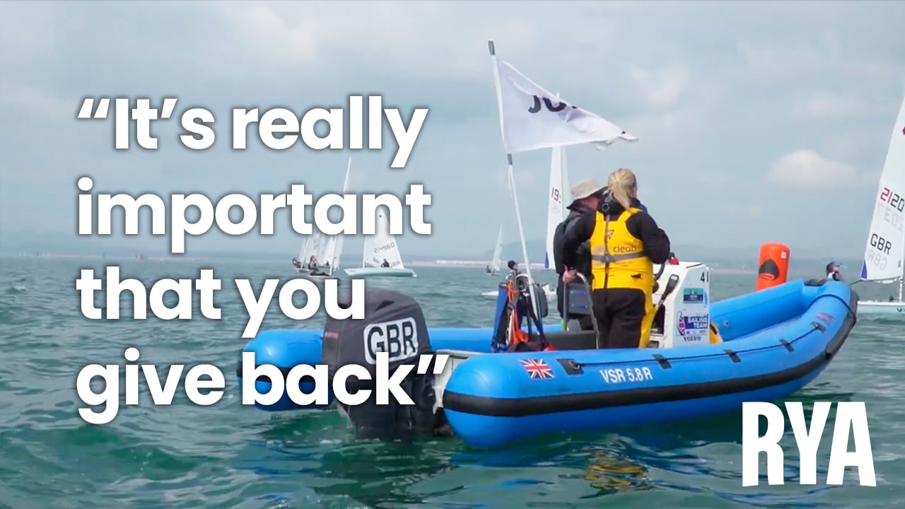 Two windsurfers on the water, featuring the caption 