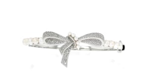 2-4.5mm Cultured Pearl and .11 ct. t.w. Diamond Bow Bangle Bracelet in Sterling Silver