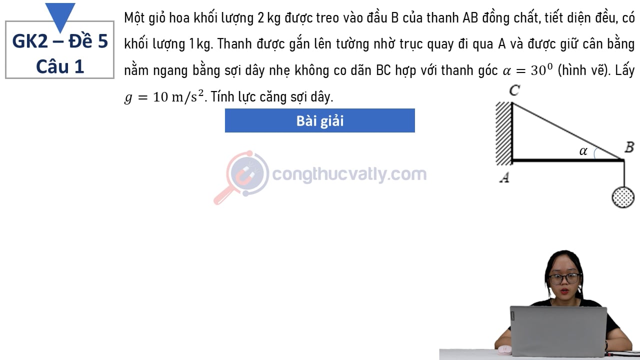 Một giỏ hoa khối lượng 2 kg được treo vào đầu B của thanh AB đồng chất, tiết diện đều, có khối lượng 1 kg.