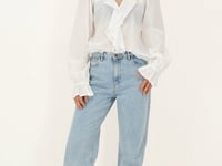 White blouse with ruffles and bows