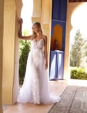 Video: White wedding dress in lace with overskirt