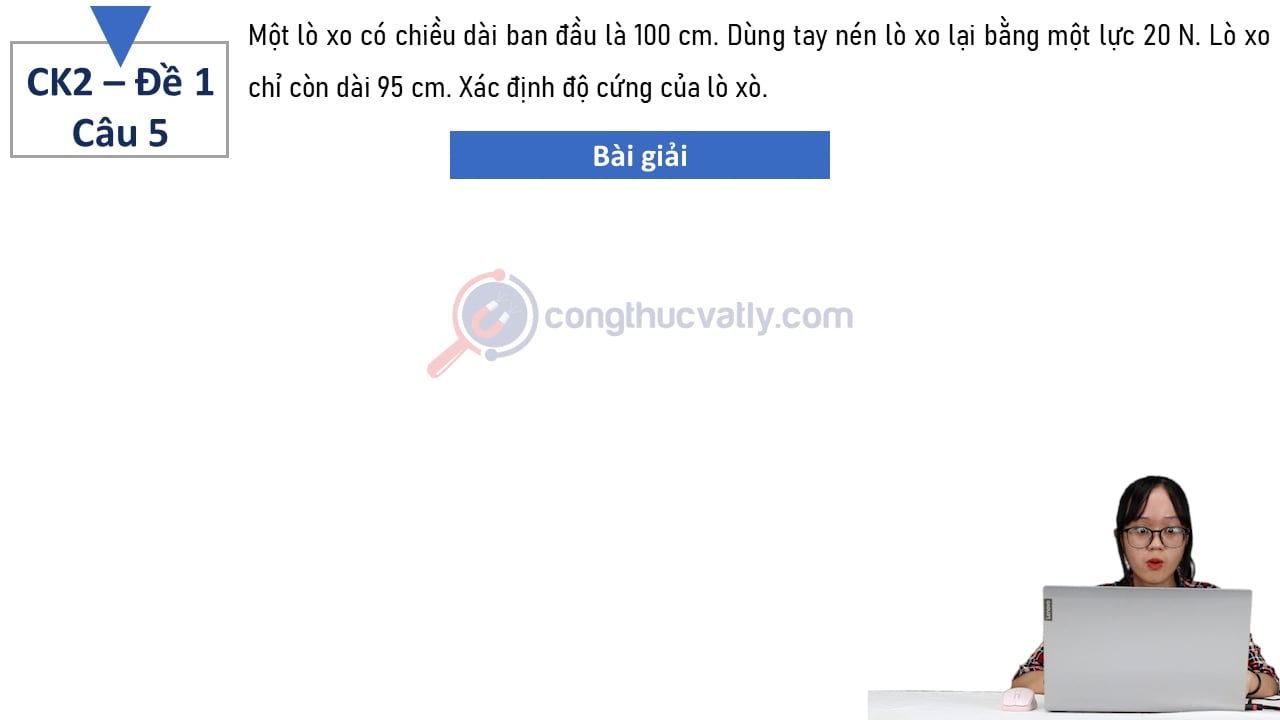 Một lò xo có chiều dài ban đầu là 100 cm.