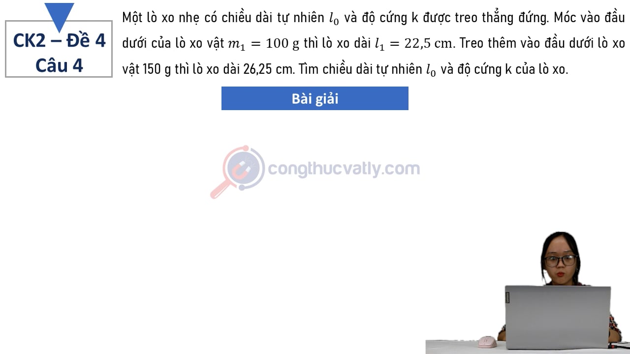 Một lò xo nhẹ có chiều dài tự nhiên l0 và độ cứng k được treo thẳng đứng.