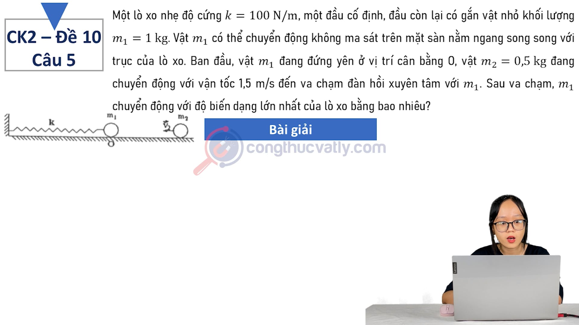 Một lò xo nhẹ độ cứng k = 100 N/m, một đầu cố định, đầu còn lại có gắn vật nhỏ khối lượng m_1 = 1 kg.