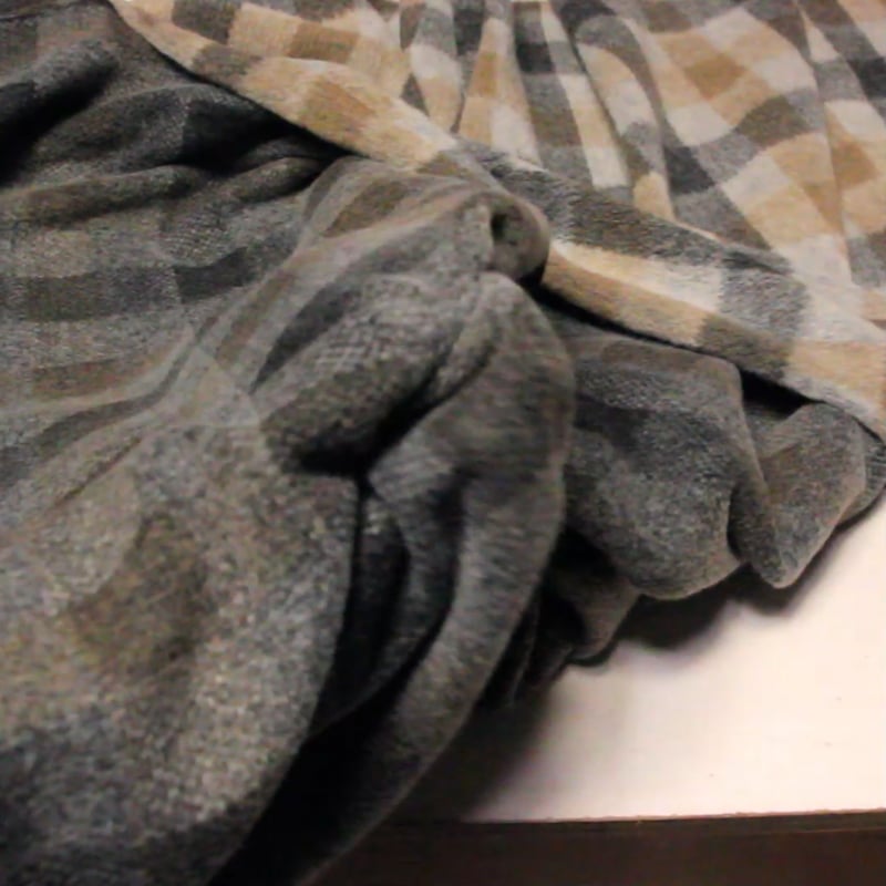 Vidéo: Laine bouillie clan - Beige & anthracite fond gris