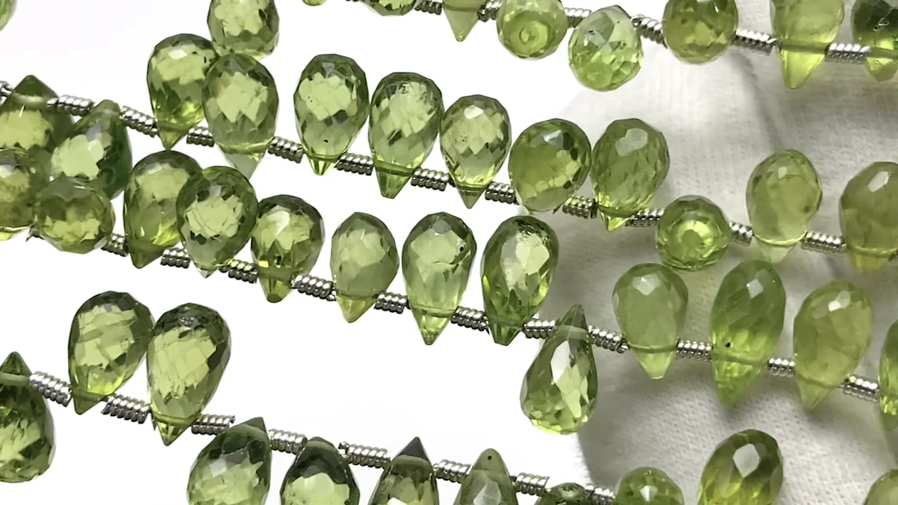 動画】宝石質ペリドットAAA ドロップ ブリオレットカット 半連/1連(約