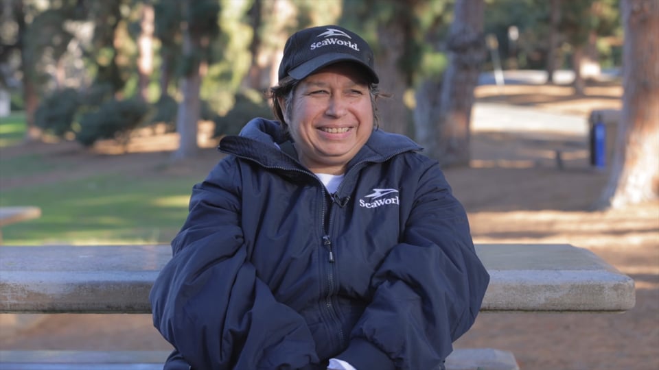 A Client smiling in between takes