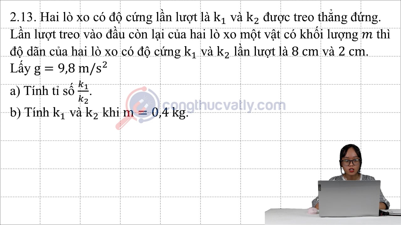 Hai lò xo có độ cứng lần lượt là k1 và k2 được treo thẳng đứng.