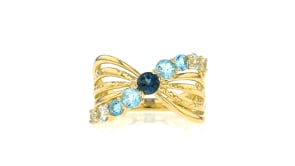 1.20 ct. t.w. Tonal Blue Topaz Bow Ring in 18kt Gold Over Sterling