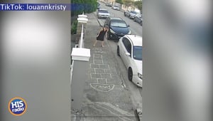 Woman Creats Hopscotch In Front of Her House