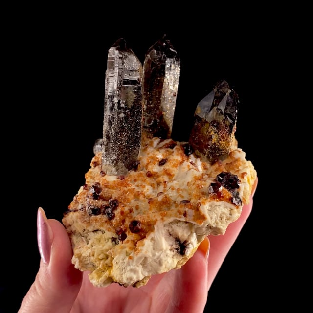 Spessartine Garnet with Quartz var: Smoky on Microcline