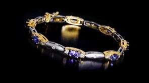 C. 1990 Vintage 4.55 ct. t.w. Tanzanite and 1.00 ct. t.w. Diamond Bracelet in 14kt Two-Tone Gold