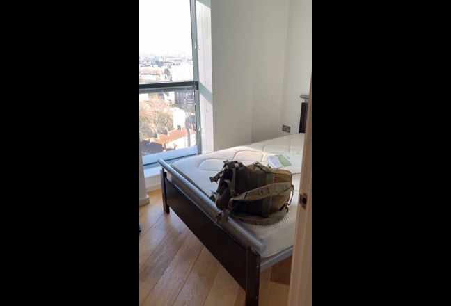 Video 1: Living room with views over Canary Wharf, a TV and a kitchen with oven and microwave and dishwasher