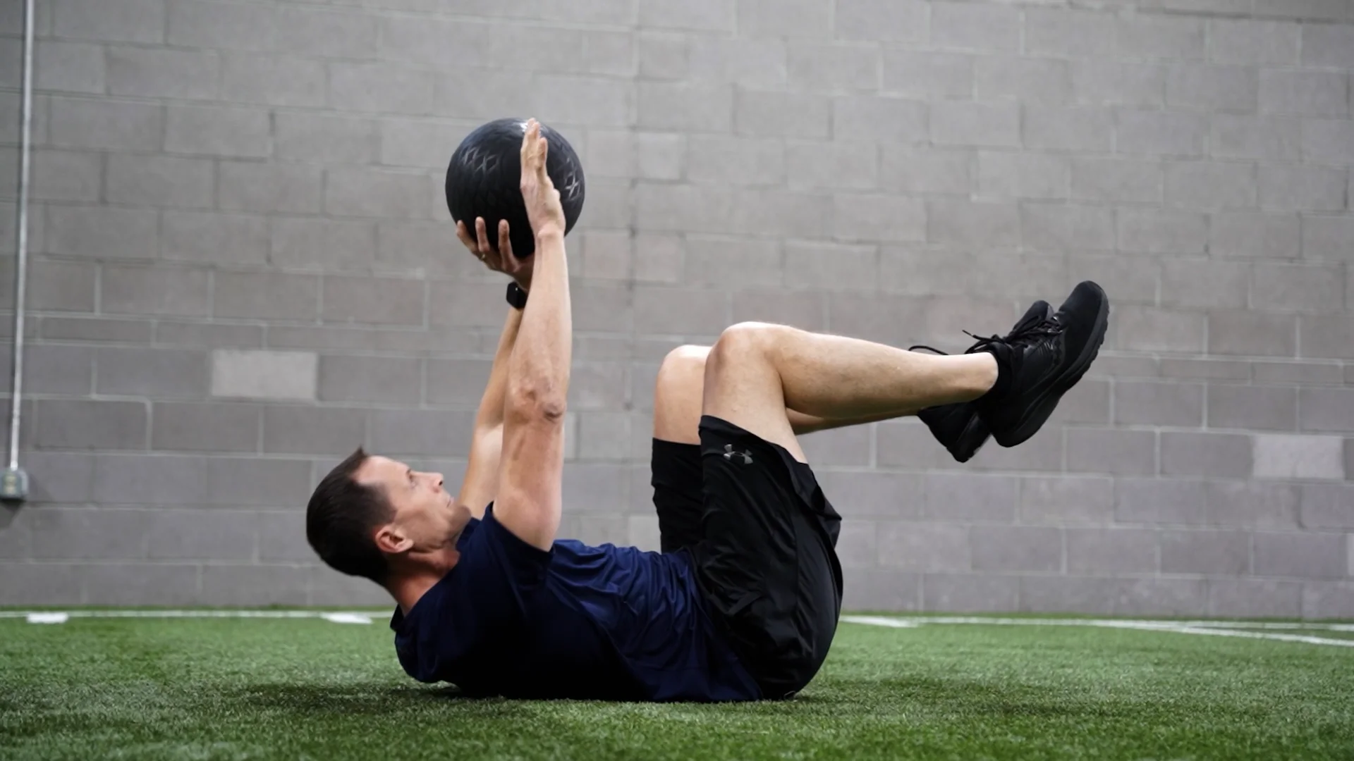 Supine with Legs Elevated at 90-90 with One Hand Hold of Med Ball ...