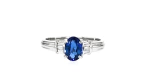 C. 2000 Vintage 1.53 Carat Sapphire Ring with .13 ct. t.w. Diamonds in Platinum