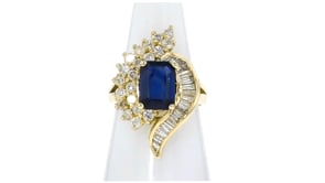 C. 1980 Vintage 2.15 Carat Sapphire and 1.20 ct. t.w. Diamond Swirl Cocktail Ring in 14kt Yellow Gold
