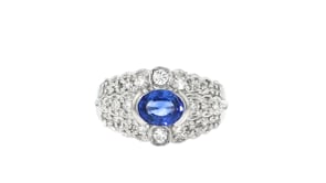 C. 1990 Vintage 1.00 Carat Sapphire and .50 ct. t.w. Diamond Ring in Platinum