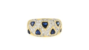 C. 1980 Vintage 1.40 ct. t.w. Sapphire and .65 ct. t.w. Diamond Heart Ring in 18kt Yellow Gold