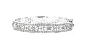 C. 1990 Vintage 1.35 ct. t.w. Diamond Openwork Bangle Bracelet in 14kt White Gold