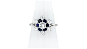 C. 1980 Vintage 1.10 ct. t.w. Diamond and .50 ct. t.w. Sapphire Cluster Ring in 14kt White Gold