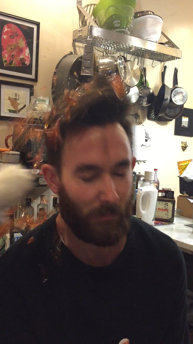brett_breakingbottle