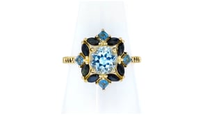 1.50 Carat Sky Blue Topaz and 1.06 ct. t.w. Sapphire Ring in 18kt Gold Over Sterling