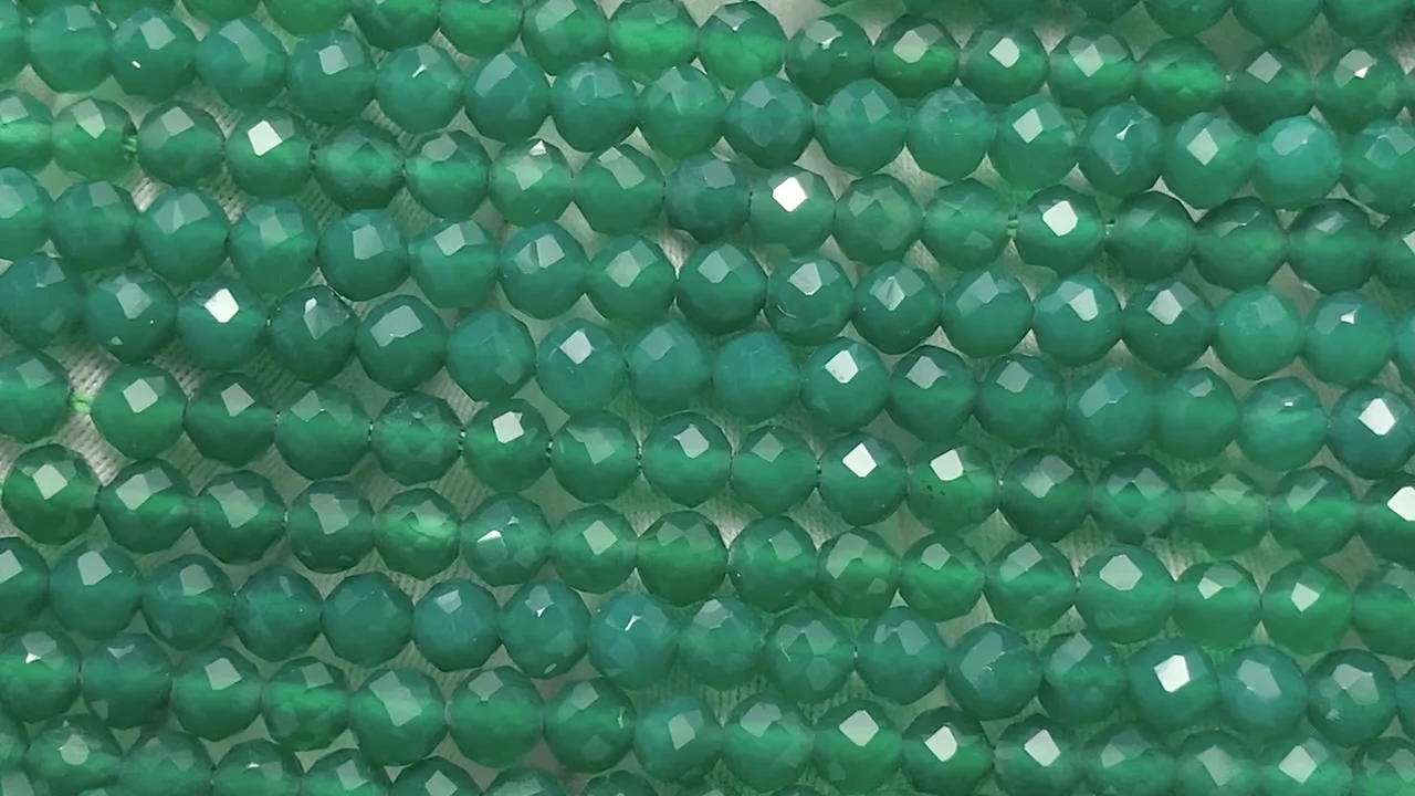 ☆天然石☆ストライプオニキス コインカット 半連《約18cm》天然石ビーズ634