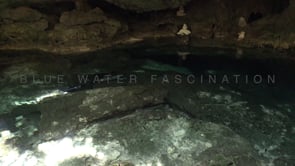1383_Scuba divers reaching exit in Cenote Tajma Ha, Yucatan Mexico.