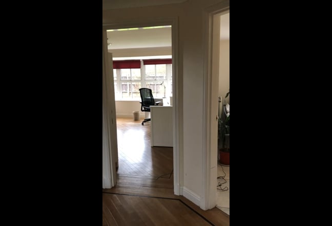 Video 1: Entrance hall with shared family room and garden visible.