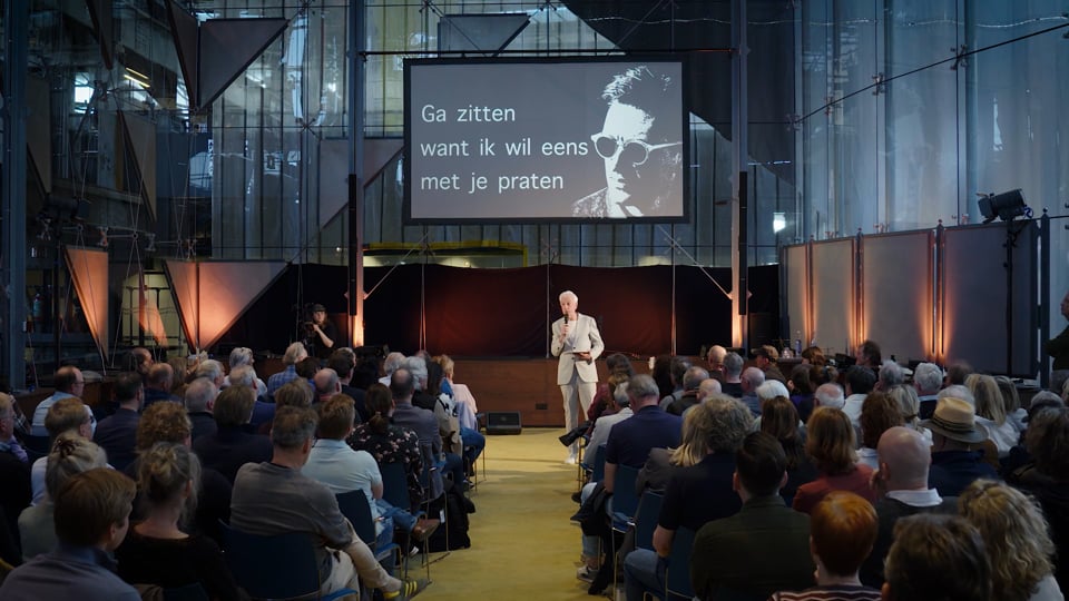Opening van de presentatie van onze plannen om in Tilburg Henny Vrienten te eren.
