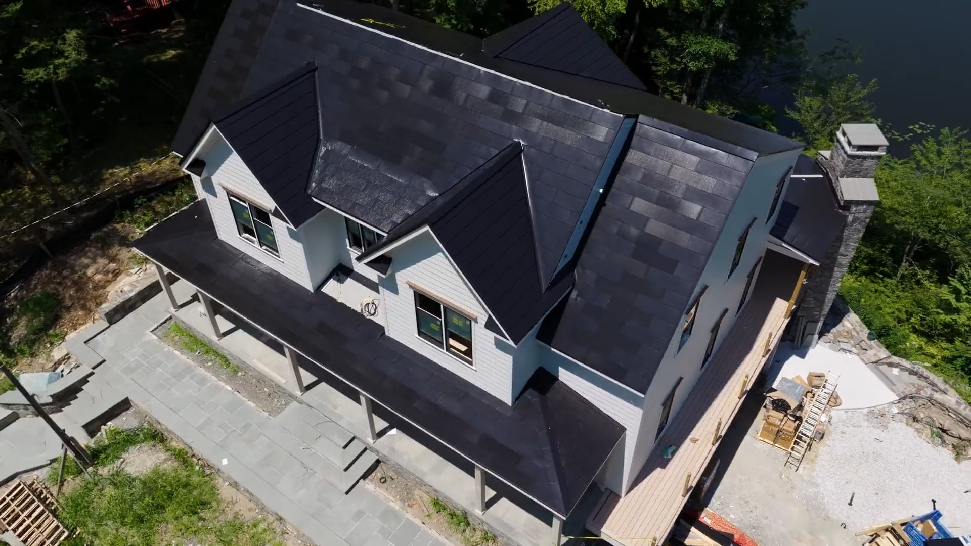Tesla Roof Installation on Lakehouse - Drone Shot