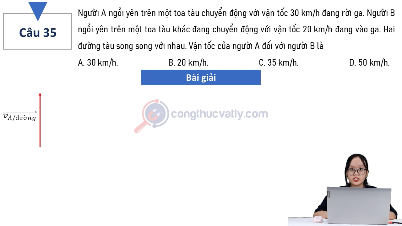 Người A ngồi yên trên một toa tàu chuyển động với vận tốc 30 km/h đang rời ga.
