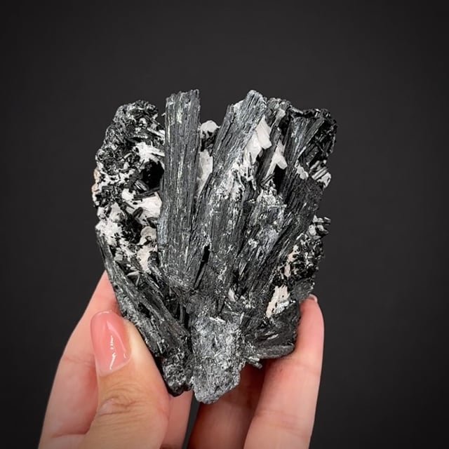 Manganite ps. Pyrolusite with Baryte