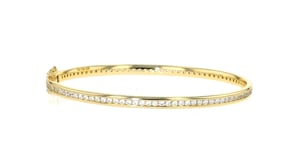 1.70 ct. t.w. CZ Eternity Bangle Bracelet in 18kt Gold Over Sterling