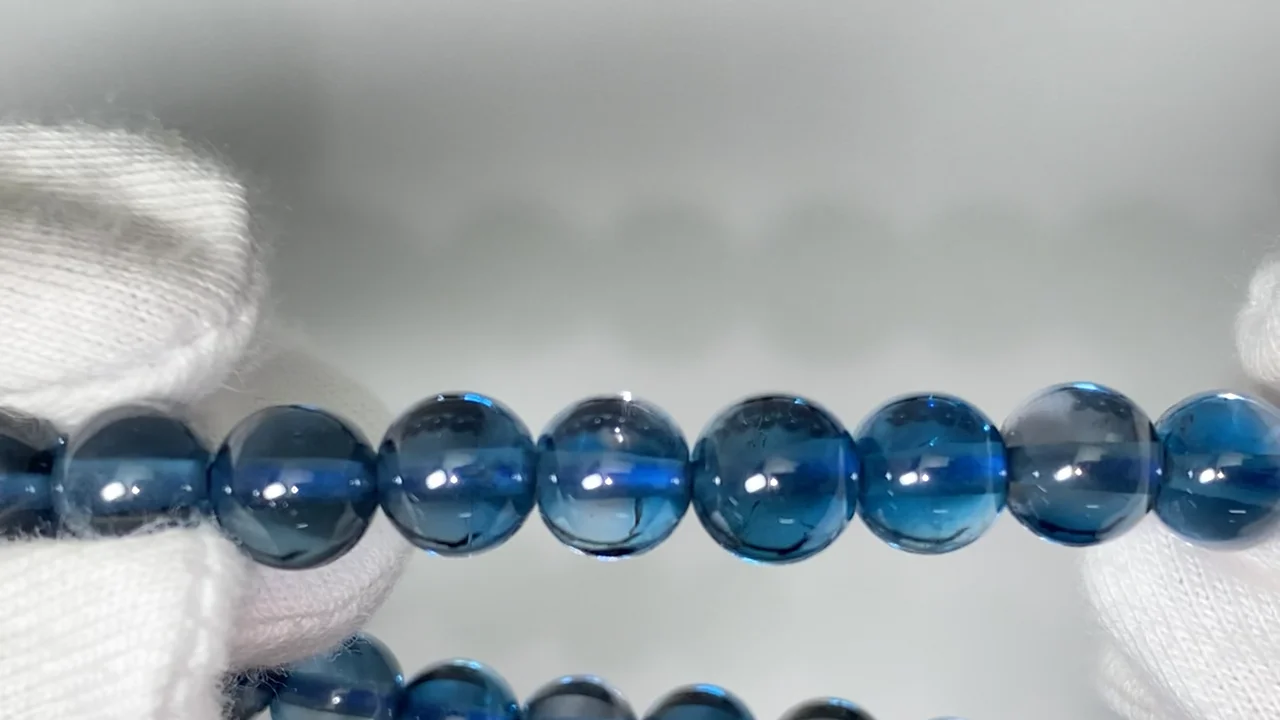 動画】【1点もの】宝石質ロンドンブルートパーズAAA ラウンド6.5mm 1連