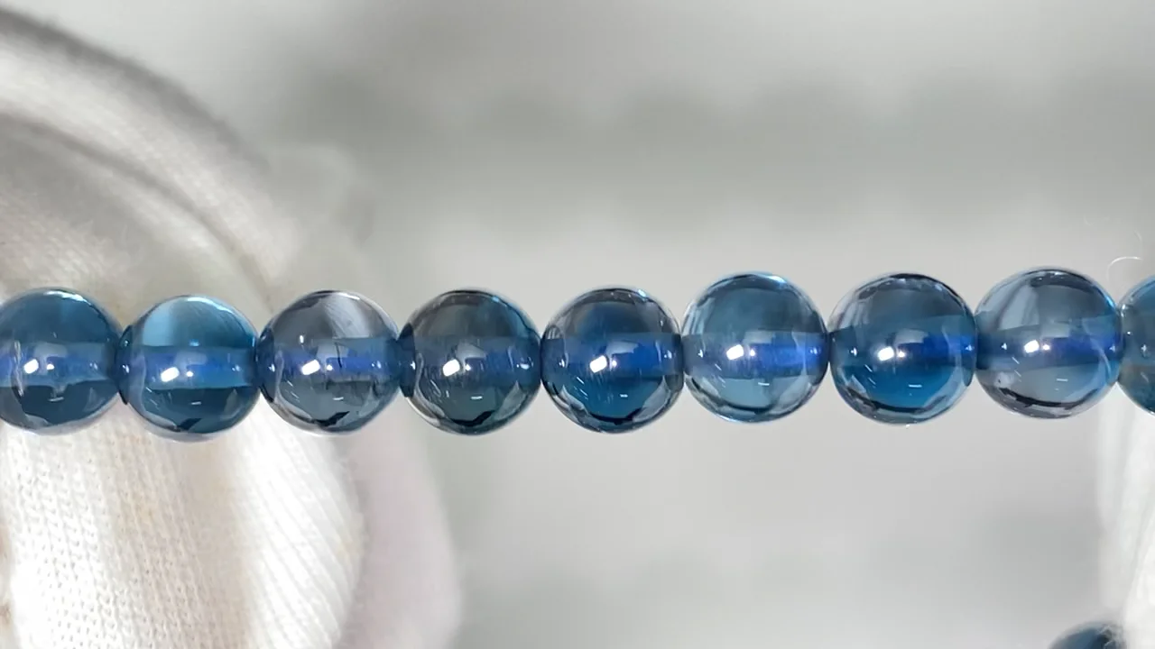 動画】【1点もの】宝石質ロンドンブルートパーズAAA ラウンド6.5mm 1連