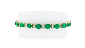 13.00 ct. t.w. Emerald Bracelet with .37 ct. t.w. Diamonds in 14kt Yellow Gold