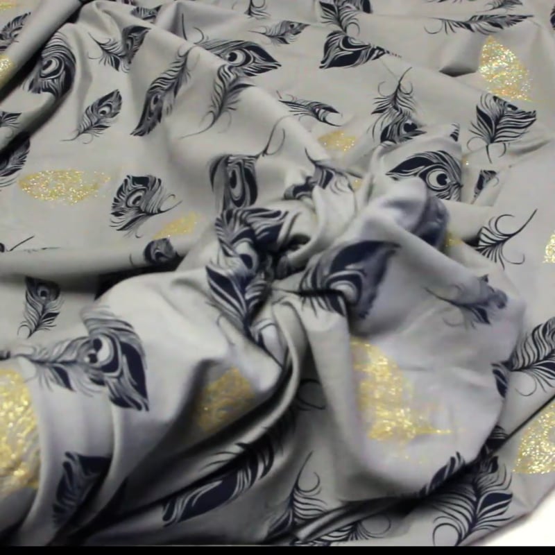 Vidéo: Molleton non gratté (French terry) - Plume bleu & doré fond gris