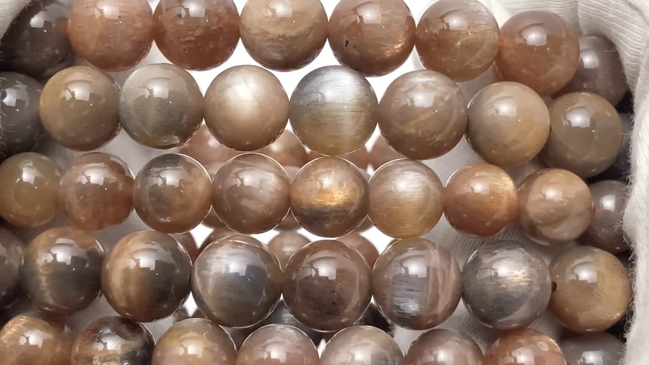 動画】サンムーンストーンAA++ ラウンド7mm 【ブラウン】 1連(ブレス