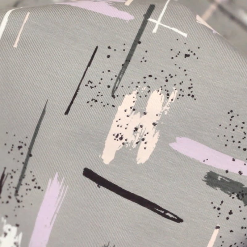 Vidéo: Jersey coton peigné & élasthanne - Trace colorée fond gris