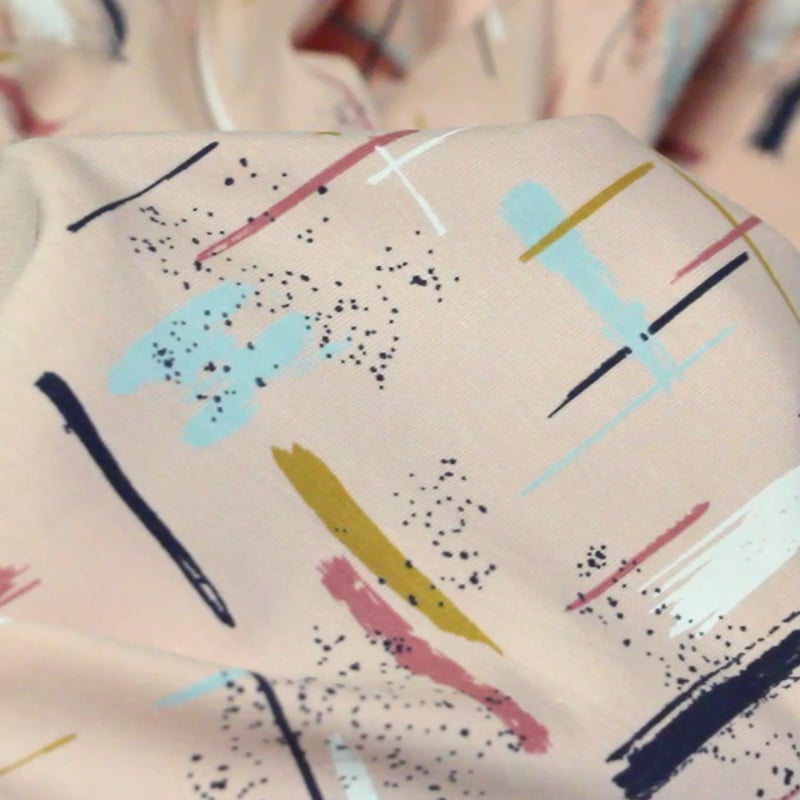 Vidéo: Jersey coton peigné & élasthanne - Trace colorée fond rose