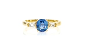 1.10 Carat Sapphire Ring with .18 ct. t.w. Diamonds in 18kt Yellow Gold