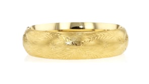 C. 1960 Vintage 14kt Yellow Gold Etched Bangle Bracelet