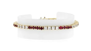 C. 1990 Vintage 3.00 ct. t.w. Ruby and 2.80 ct. t.w. Diamond Tennis Bracelet in 18kt Yellow Gold
