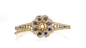 C. 1960 Vintage 1.65 ct. t.w. Sapphire and 1.05 ct. t.w. Diamond Flower Bangle Bracelet with Seed Pearls in 14kt Yellow Gold