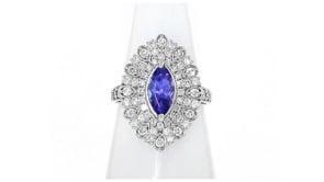 C. 1990 Vintage 1.24 Carat Tanzanite and .87 ct. t.w. Diamond Ring in Platinum