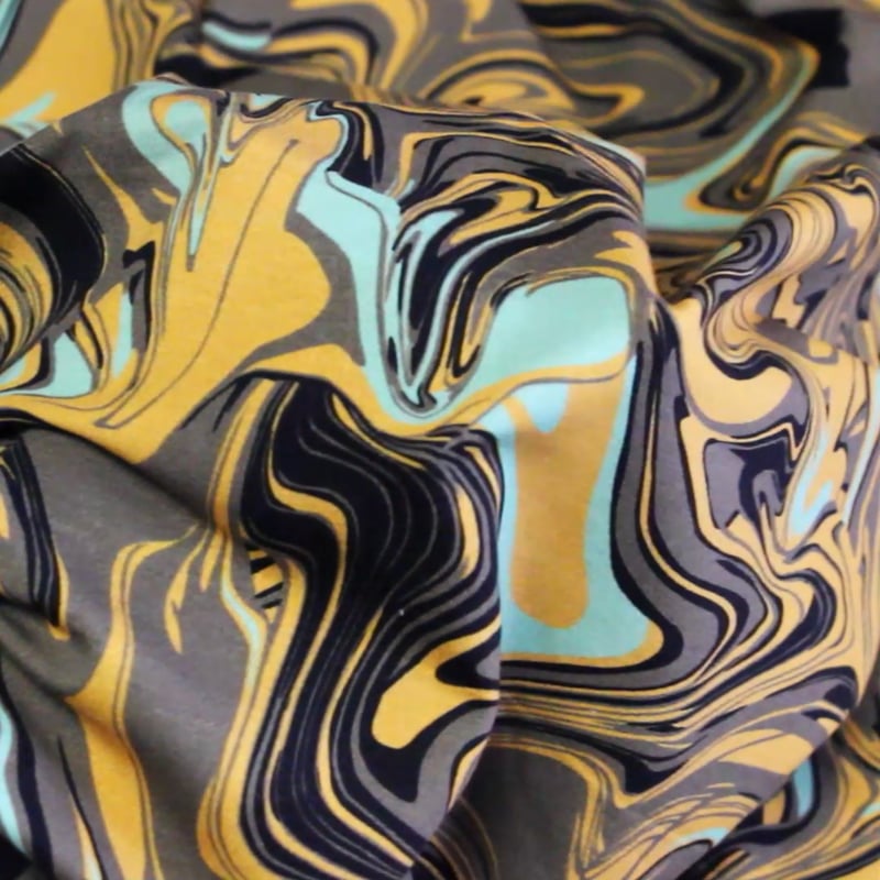 Vidéo: Jersey coton peigné & élasthanne – Marbré jaune vert noir